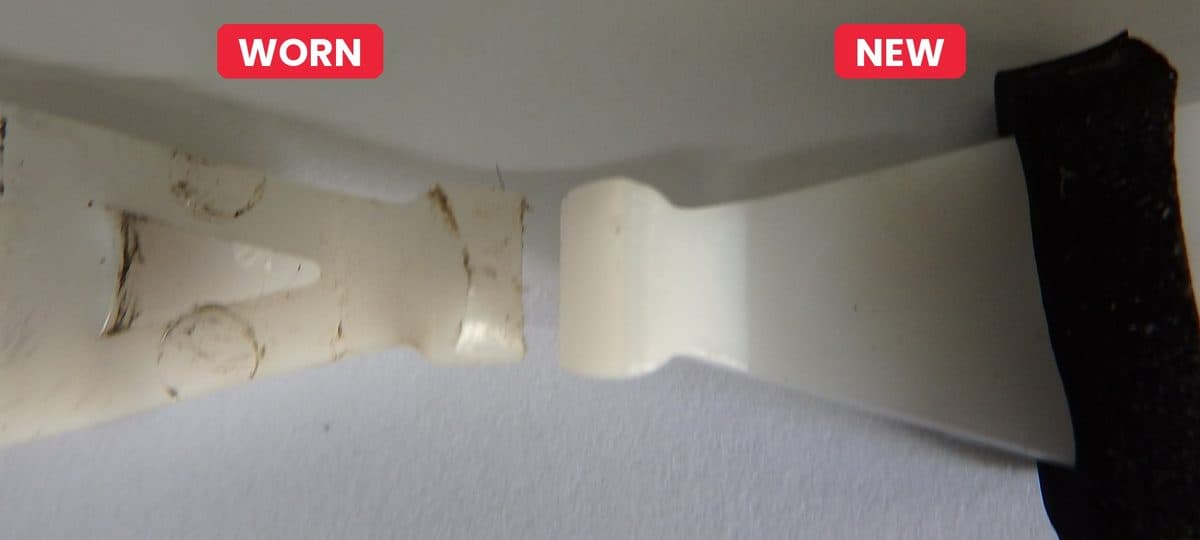 Close-up of two blade drive tips: the worn one is rounded and the new one is square